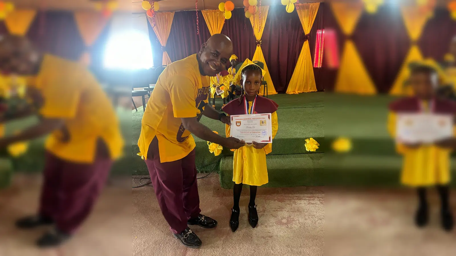 Deutsche-Lebensbrücke-Kind Famata mit FMI-Schulleiter Joe Reeves. (Foto: Deutsche Lebensbrücke)