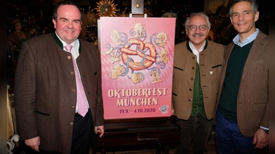 So sieht das neue Wiesnplakat aus. Pink ist es und mit einer Riesnbreze drauf. V.l.n.r.: Clemens Baumgärtner, Otto Seidl, Dr. Lajos Csery. (Foto: Robert Bösl)