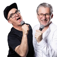 Uli Wurschy (l.) und Volker Becker stehen am 21. Oktober in der Halle E im Gasteig HP8 auf der Bühne und moderieren das Rudelsingen. (Foto: Joachim Pantel)