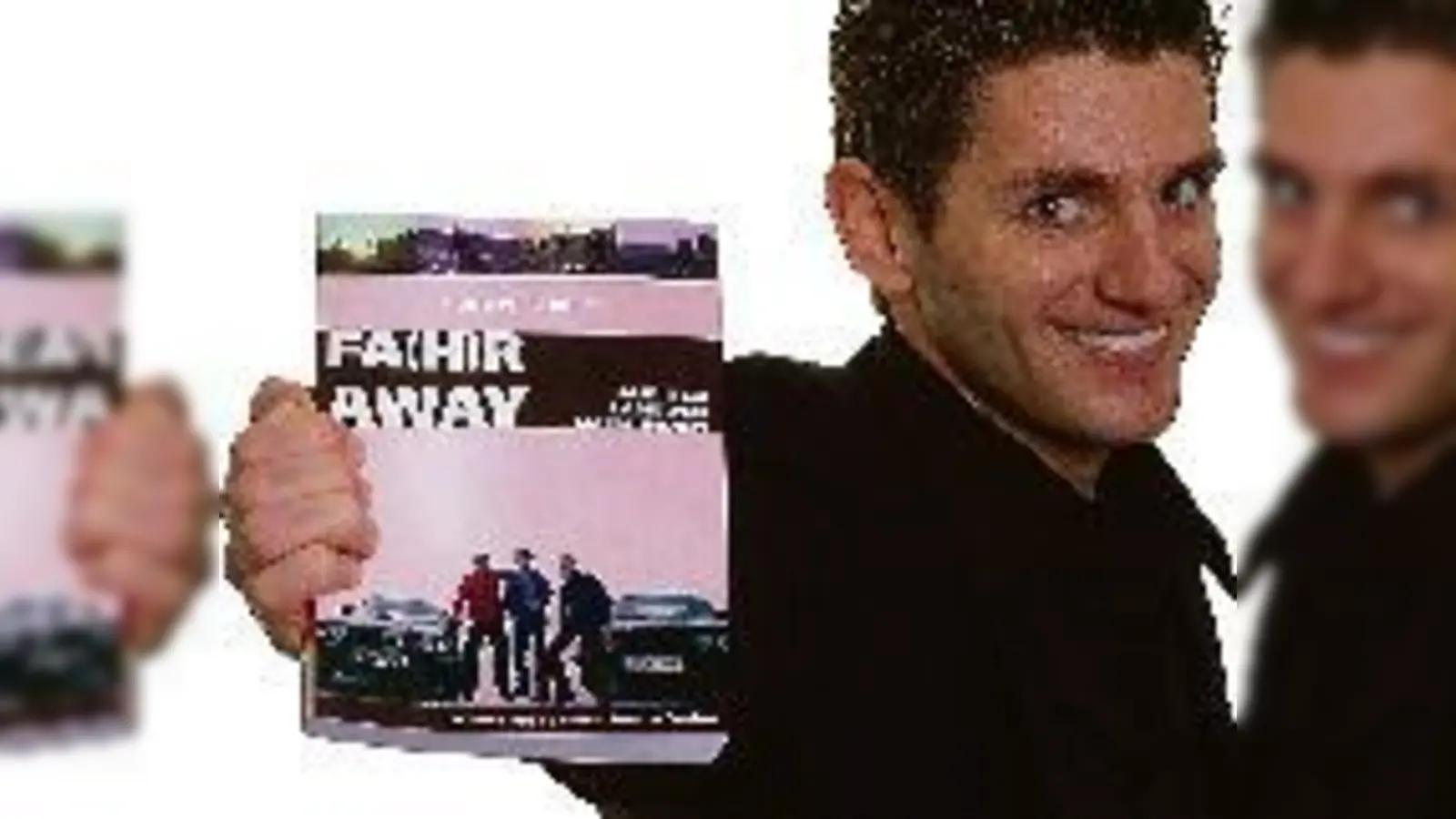 Hubert Luible mit seinem Buch über die ungewöhnliche Reise nach Indien  in zwei BMWs.  (Foto: Privat)