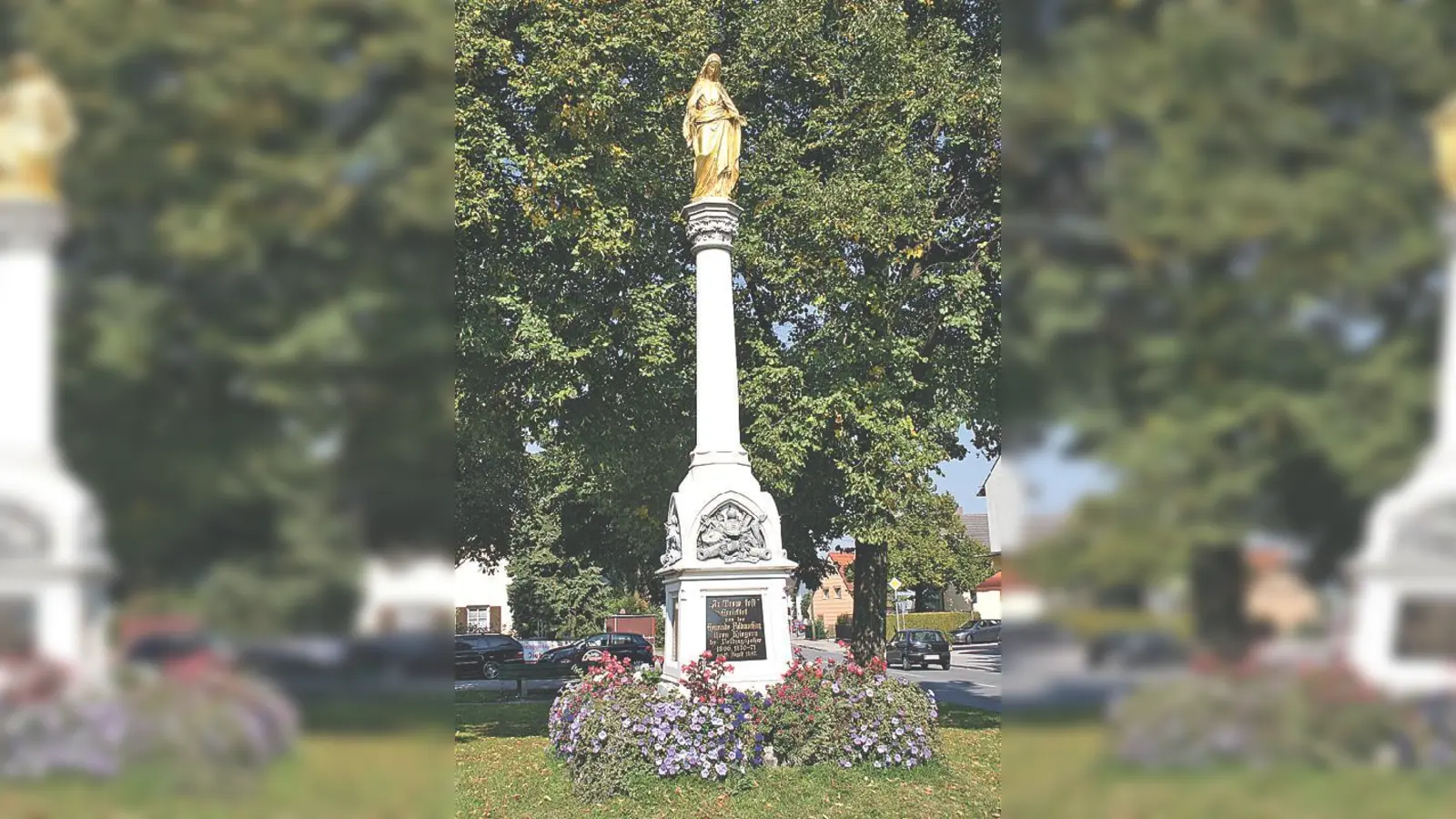 Im ländlich geprägten Dorfkern von Feldmoching steht auch eine Mariensäule. 	 (Foto: ws)