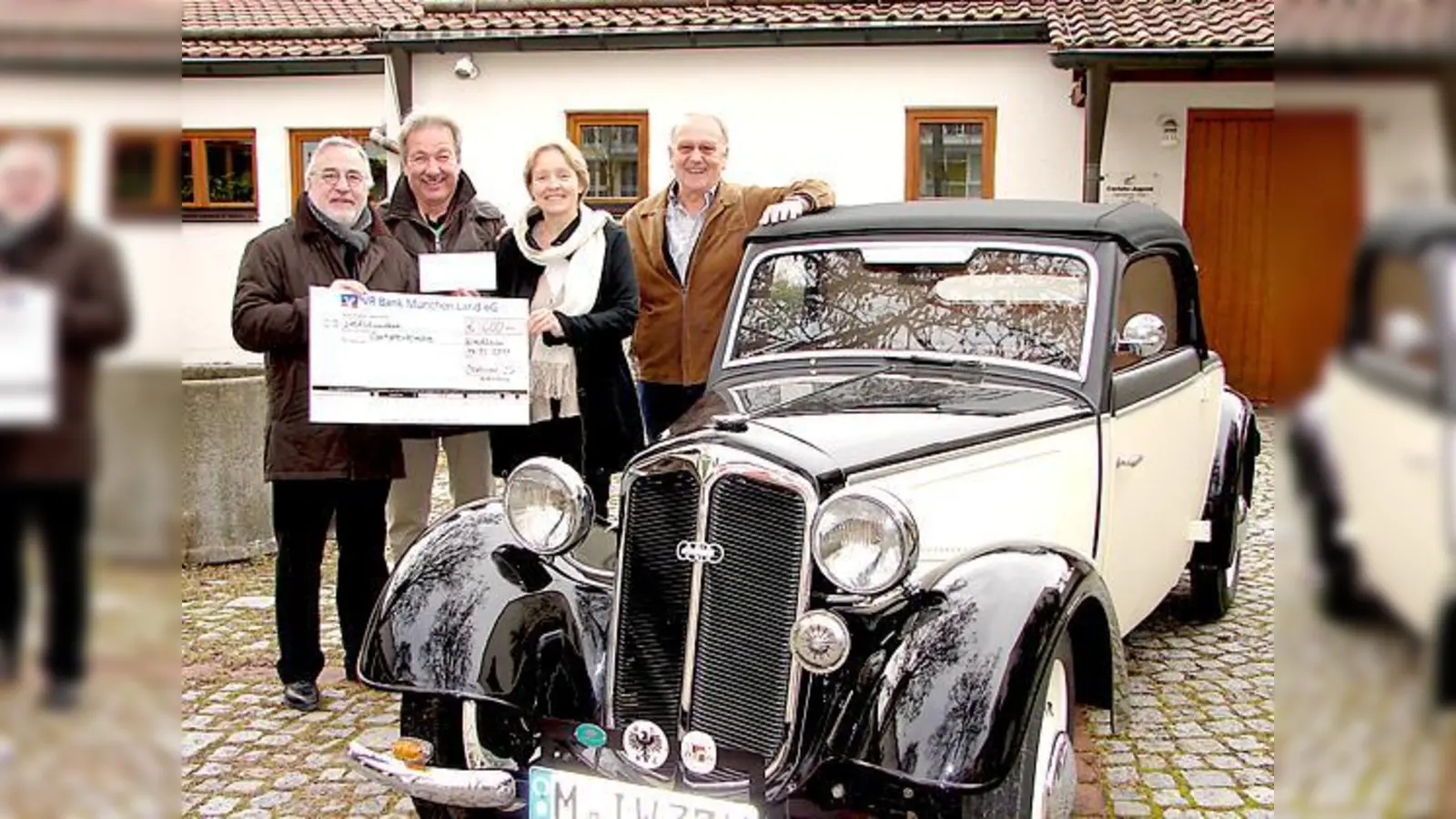 Bei der Spendenübergabe an die Pfarrerin der Cantate Kirche, Susanne Kießling-Prinz, war auch ein DKW F 7 Baujahr 1937 dabei.	 (Foto: privat)