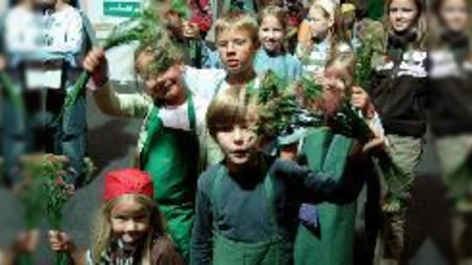  In der Spielstadt Mini-München können Kinder sich in den unterschiedlichsten Berufen ausprobieren  auch als Gärtner. 	 (Foto: Kultur & Spielraum e.V.)