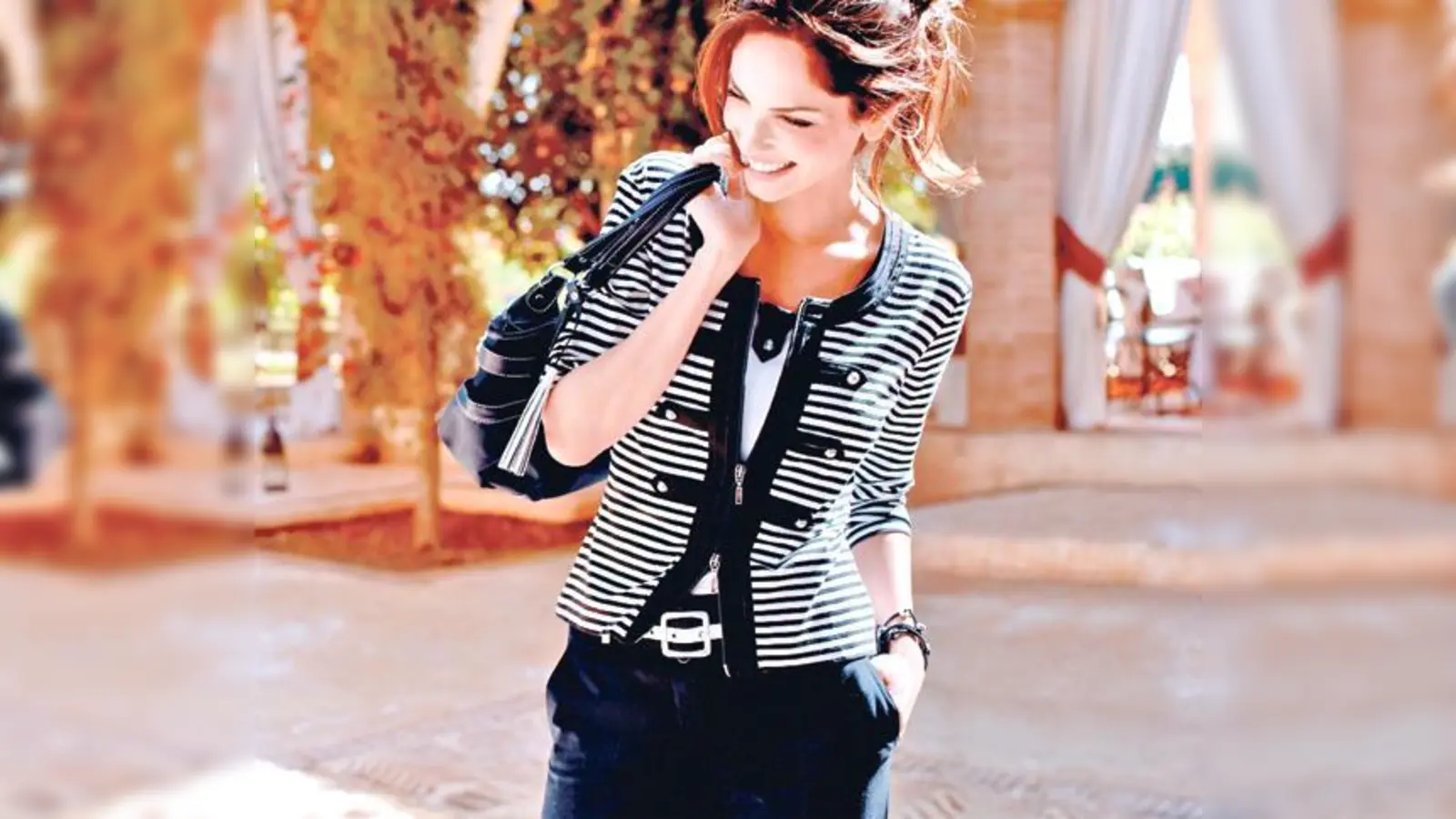 Sehr weiblich: Die schmale Silhouette wird durch die kurze Jacke betont.                     (Foto: Gerry Weber)