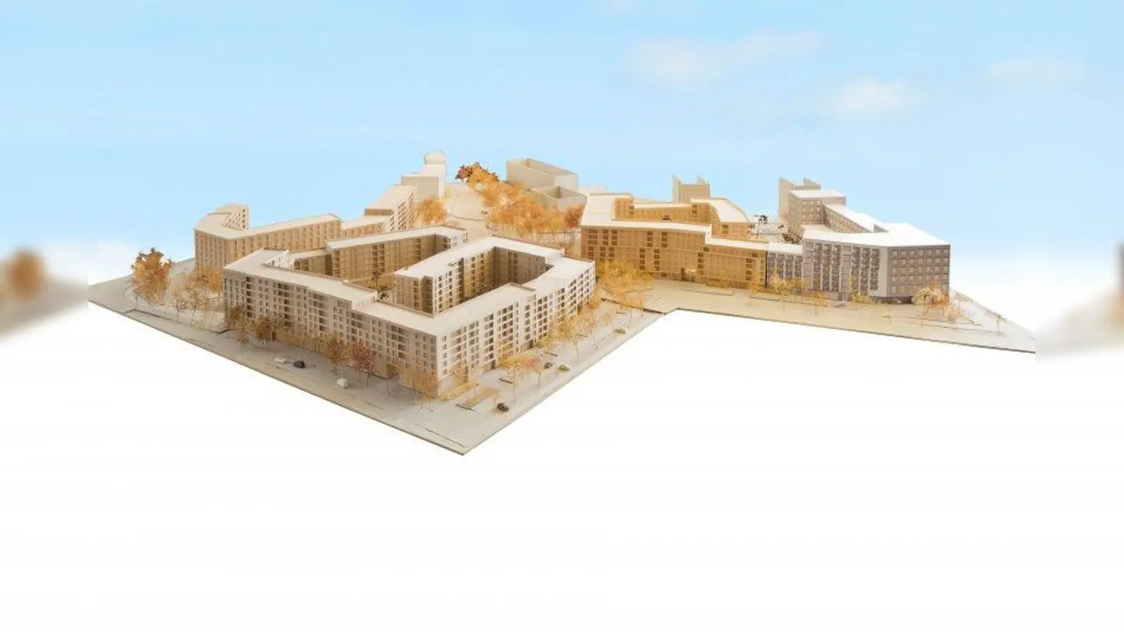 Wohnen „Am Südpark” im Modell: Die beigen Gebäude beginnend am linken Bildrand (Boschetsrieder Straße / Drygalski-Allee) stellen den Wohnungsbau inklusive soziale Infrastruktur dar. Das weiß-graue Gebäude (rechts) wird für ein Ärztezentrum, Büros, Einzelhandel und Studentenwohnen errichtet. (Foto: Accumulata Immobilien Development, Concept Real zwei)