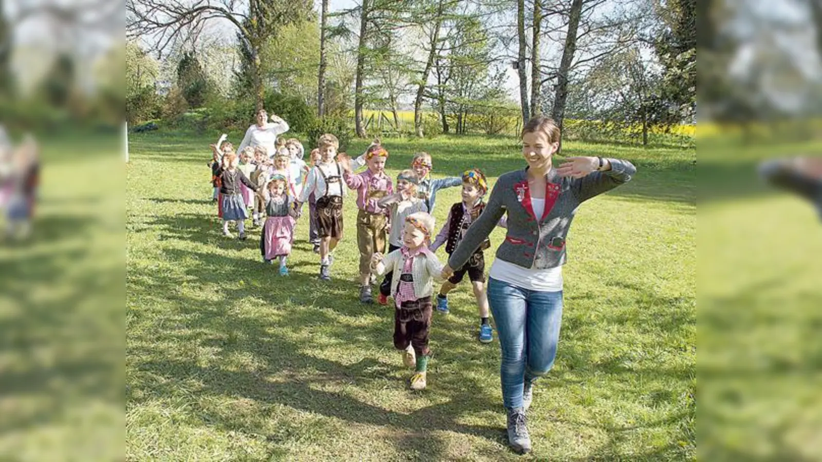 Der Integrations- und Waldkindergarten Unterhaching e.V. feiert den Mai.	 (Foto: Kiga)