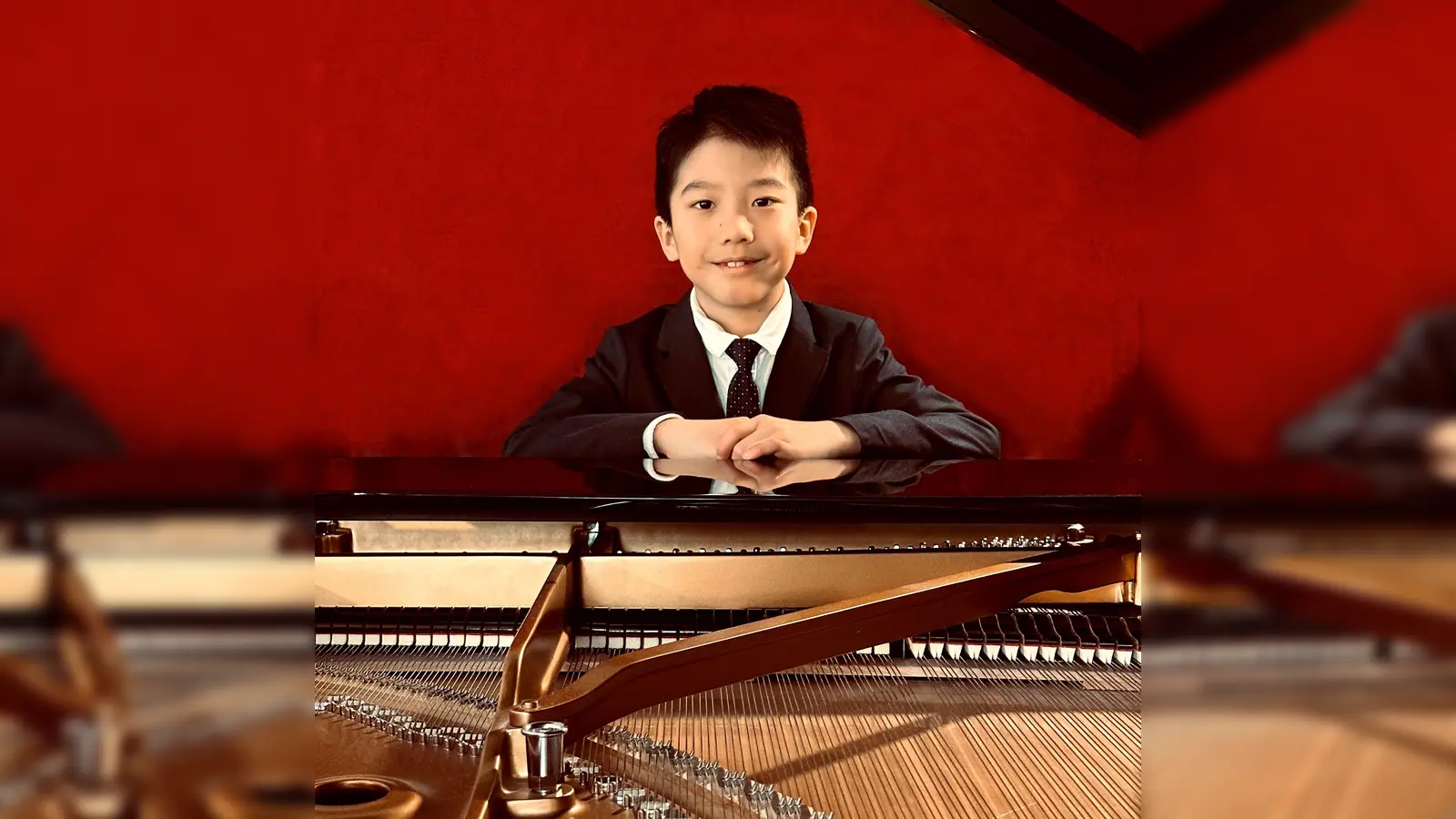 Erst neun Jahr alt, aber schon ein Profi: der Pianist Louis Zhang. (Foto: Yinging Chen)