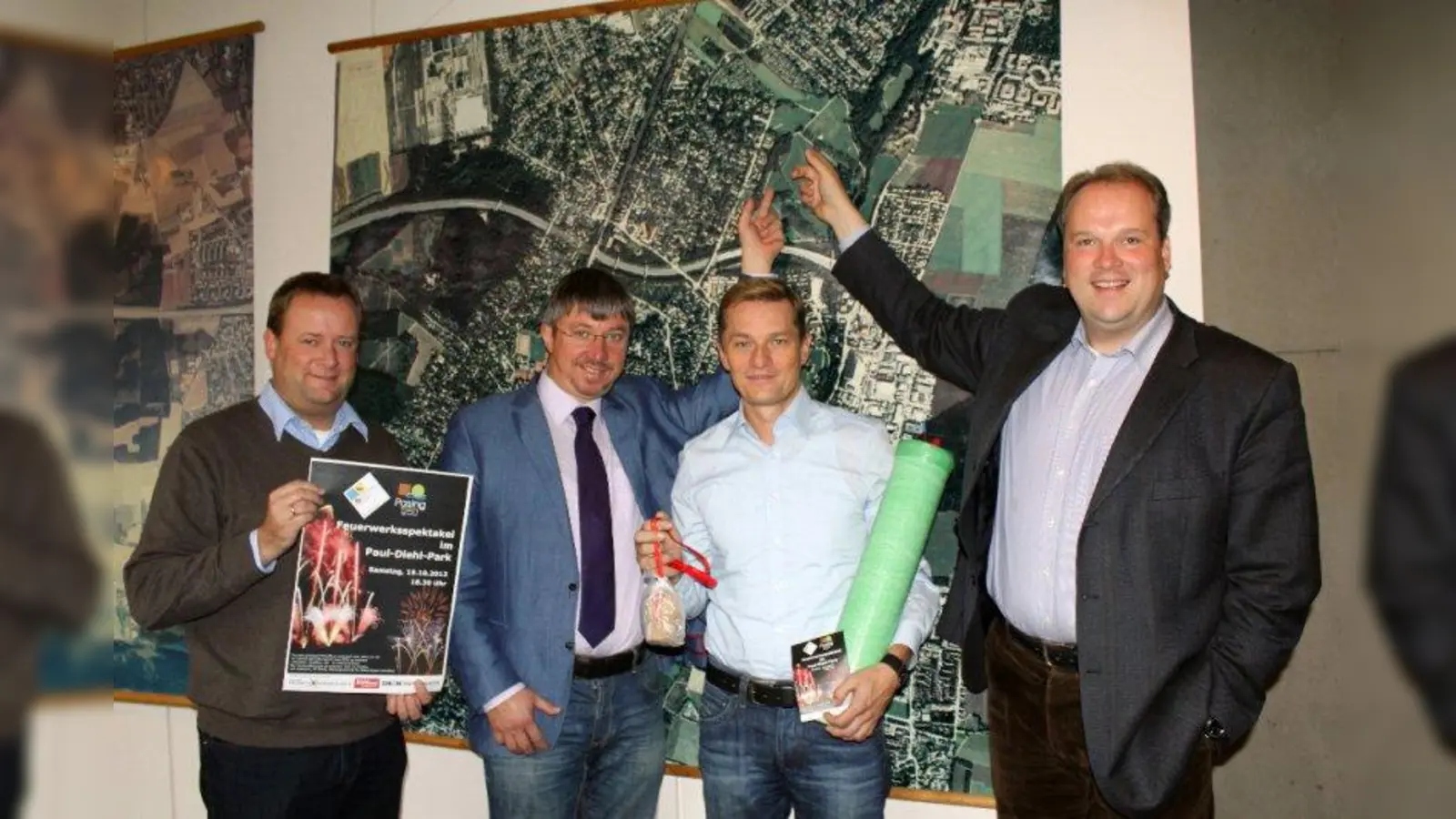 „Wir lassen das Jubiläumsjahr gemeinsam ausklingen.“ Peter Köstler, Christian Müller, Thomas Jorhann und Christoph Göbel (v.l.) vor dem Plan des Paul-Diehl-Parks. (Foto: US)