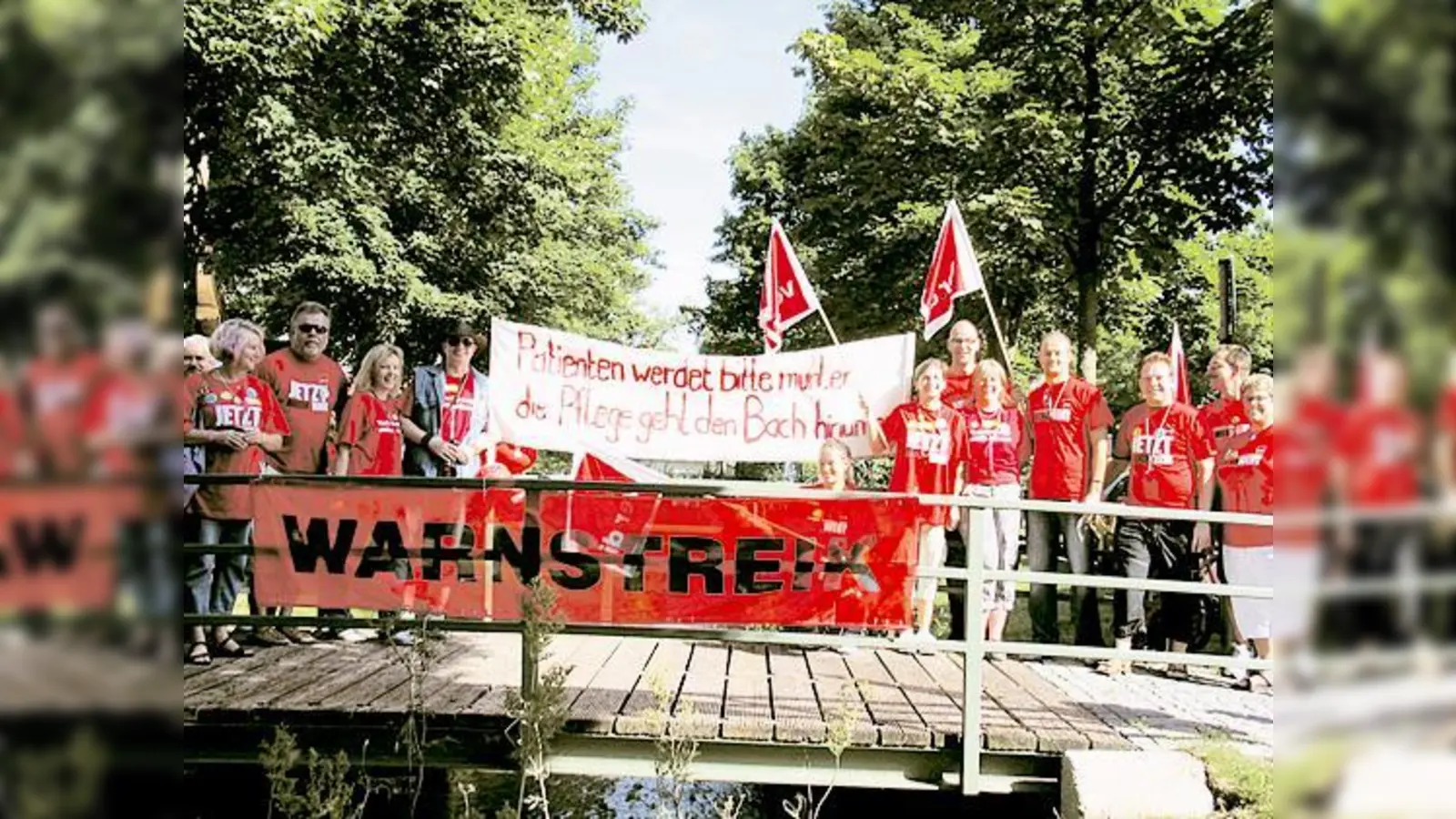 Pfleger der Perlacher Klinik beim Warnstreik am  Hachinger Bach.  (Foto: aha)