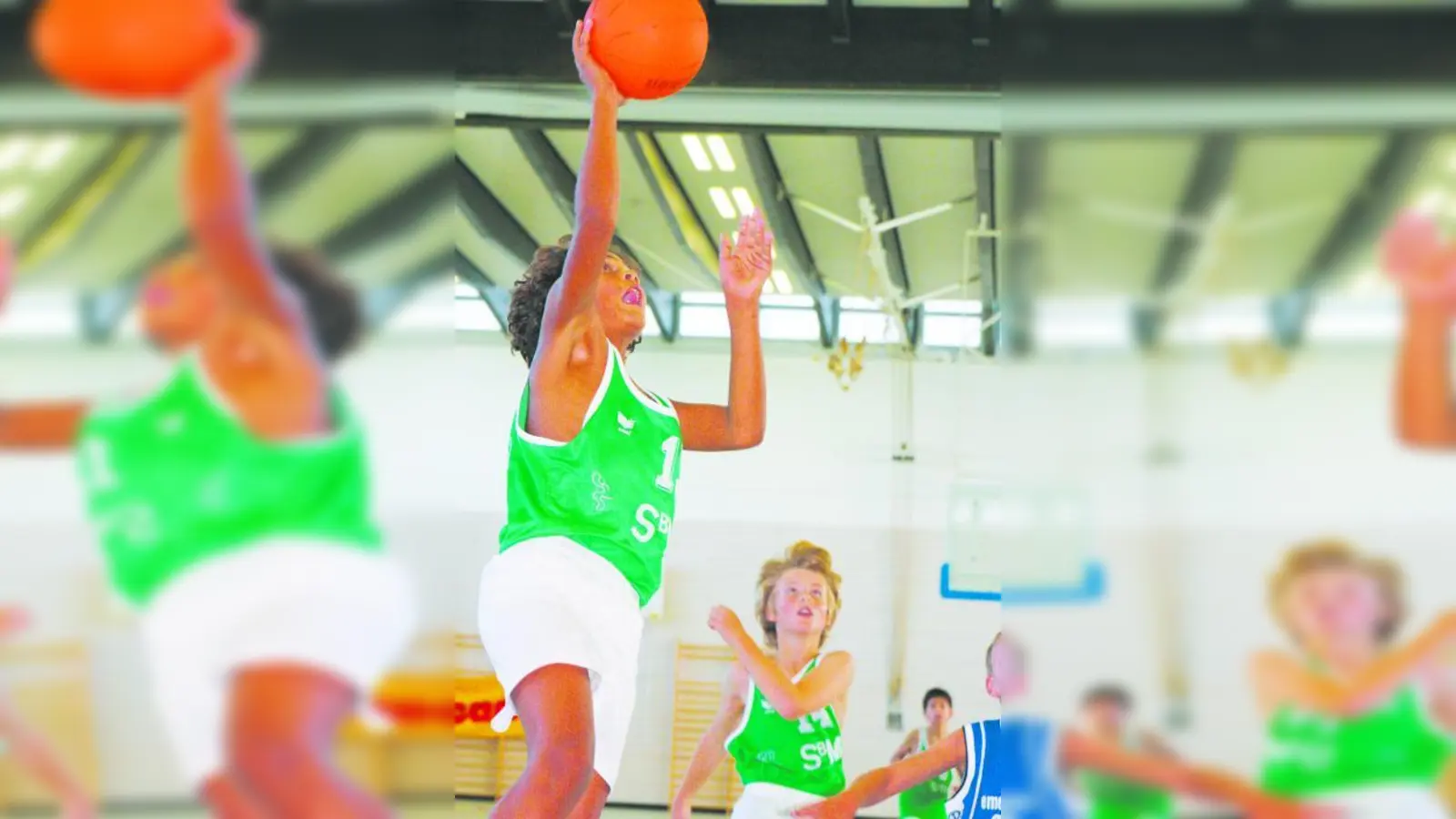 Unterm Korb: Oscar Da Silva, gerade elf Jahre alt und seit drei Jahren fleißig im Training, spielt schon fast perfekt Basketball; abgesichert von Linus Weber. (Foto: H. Handwerker)