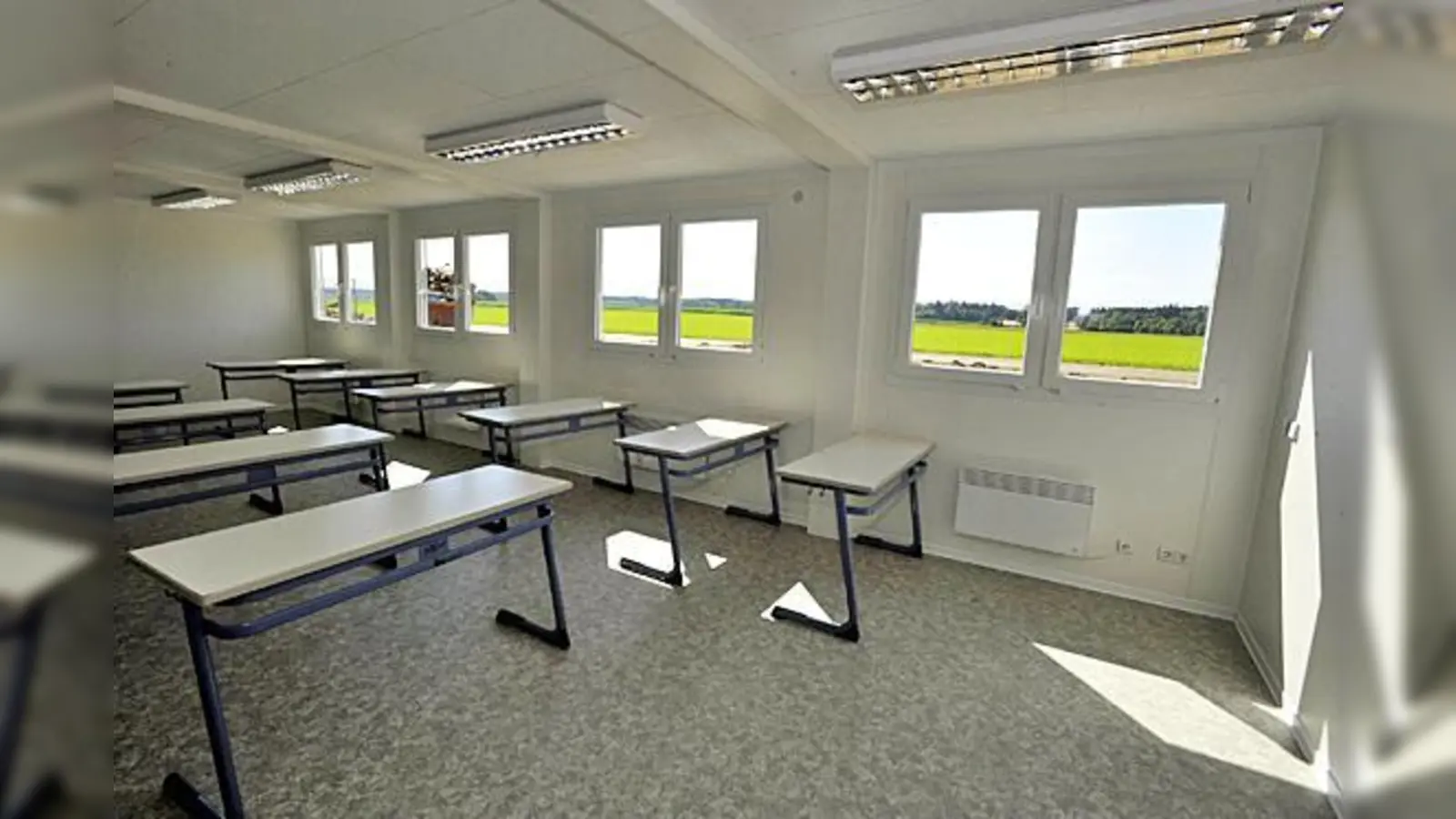 Ob die Schüler des Neubiberger Gymnasiums in ihre Container in Höhenkirchen-Siegertsbrunn zurückkehren können, ist noch ungewiss. 	 (Foto: Schunk)