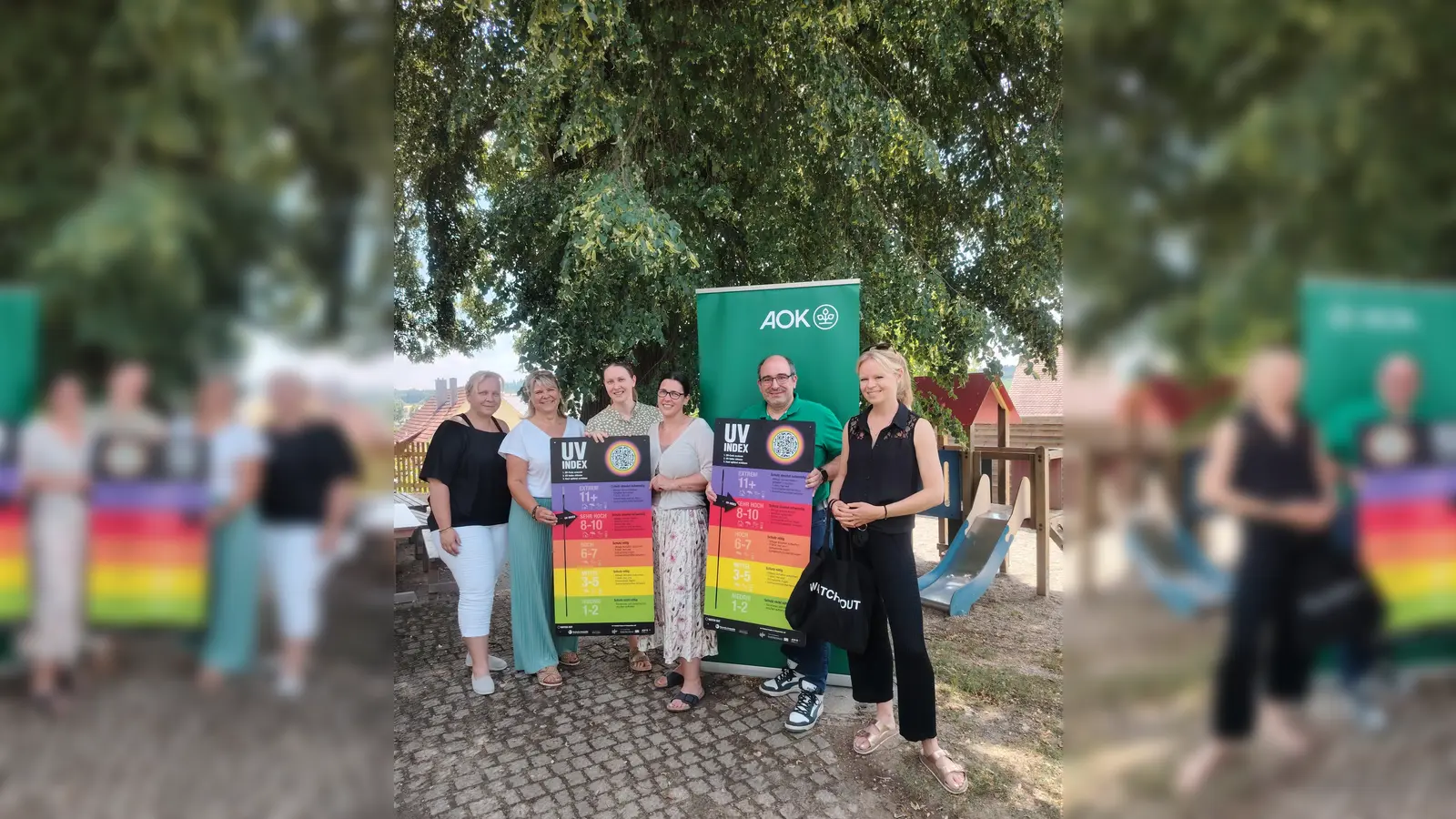 Neue UV-Index-Tafeln für die Erdweger Kinderhäuser (v. li.): C. Jokeit, Gruppenleitung Kinderhäuser bei den Linden, Standort Welshofen, P. Aidelsburger, Gesamtleitung, S. Härpfer, Gesundheitswirtschaft, M. Hennersdorf, Hausleitung Kinderhäuser am Zeitlbach, Standort Kleinberghofen, M. Georg, AOK Bayern, und C. A. Jung, Arbeitsgemeinschaft Dermatologische Prävention. (Foto: Gemeinde Erdweg)