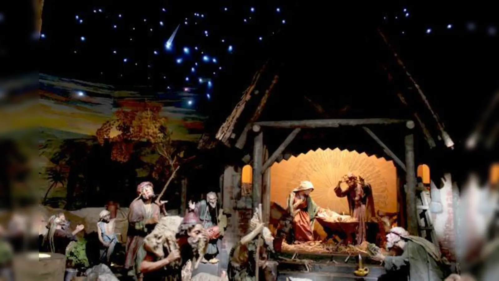 Mit einem ausgeklügelten Lichtsystem leuchten Sterne über Sankt Ursulas Osterrieder Krippe. 	 (F.: Kirche)