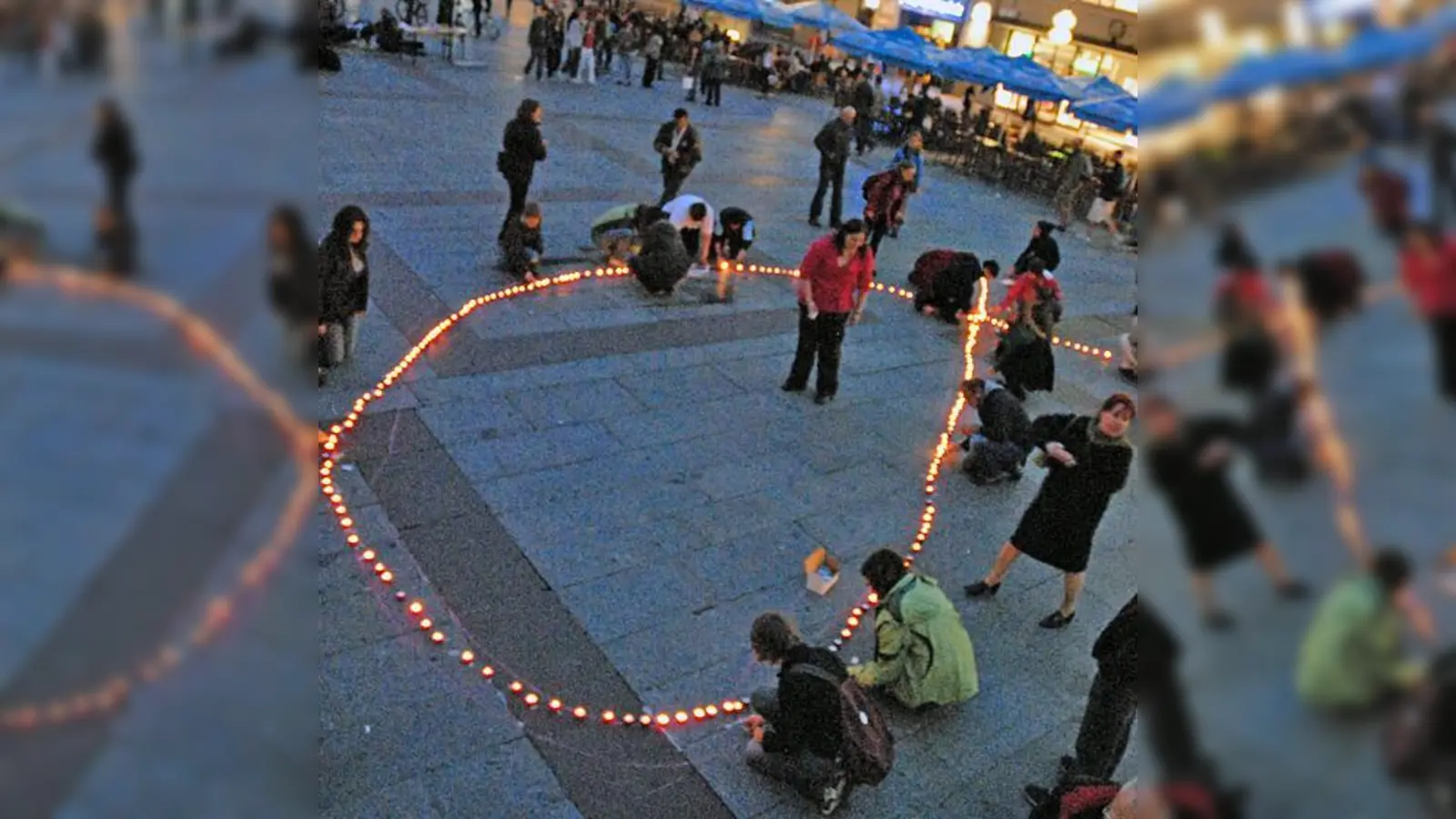 Eine Aidsschleife aus roten Kerzenlichtern soll die Solidarität mit den Infizierten, den Erkrankten und den an Aids Verstorbenen zum Ausdruck bringen.  (Foto: VA)