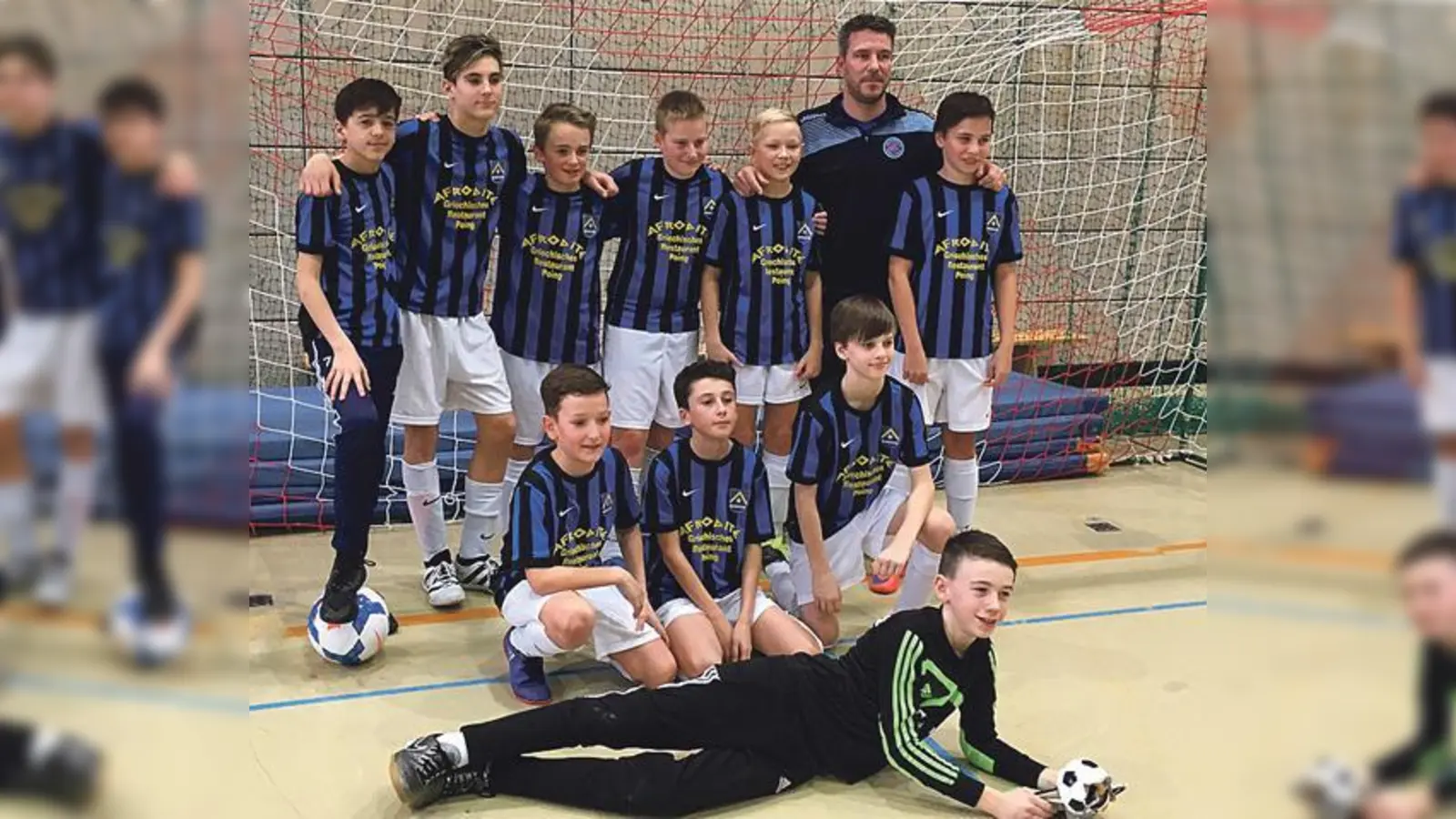 So sehen Sieger aus: Die D 1-Junioren der SG Poing/Parsdorf mit ihrem Trainer Michael Maguhn.	 (Foto: TSV Poing)