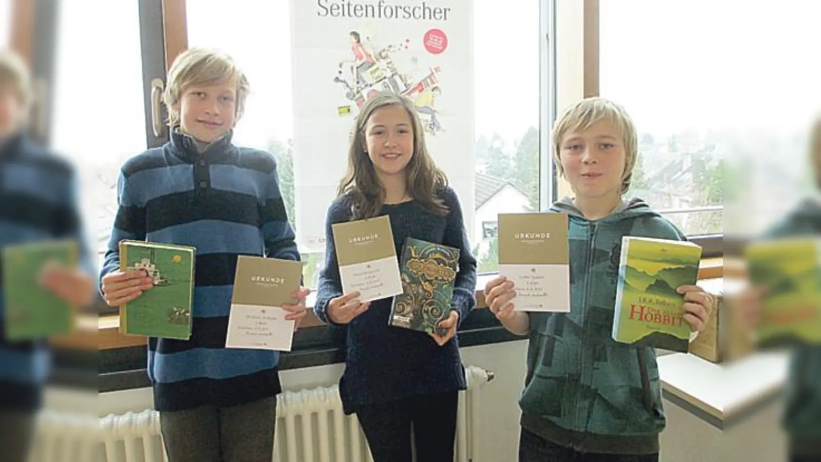 Leonie Meichelböck (Mitte) siegte vor Lukas Teubner (rechts) und Christian Arzberger.	 (Foto: Schule)