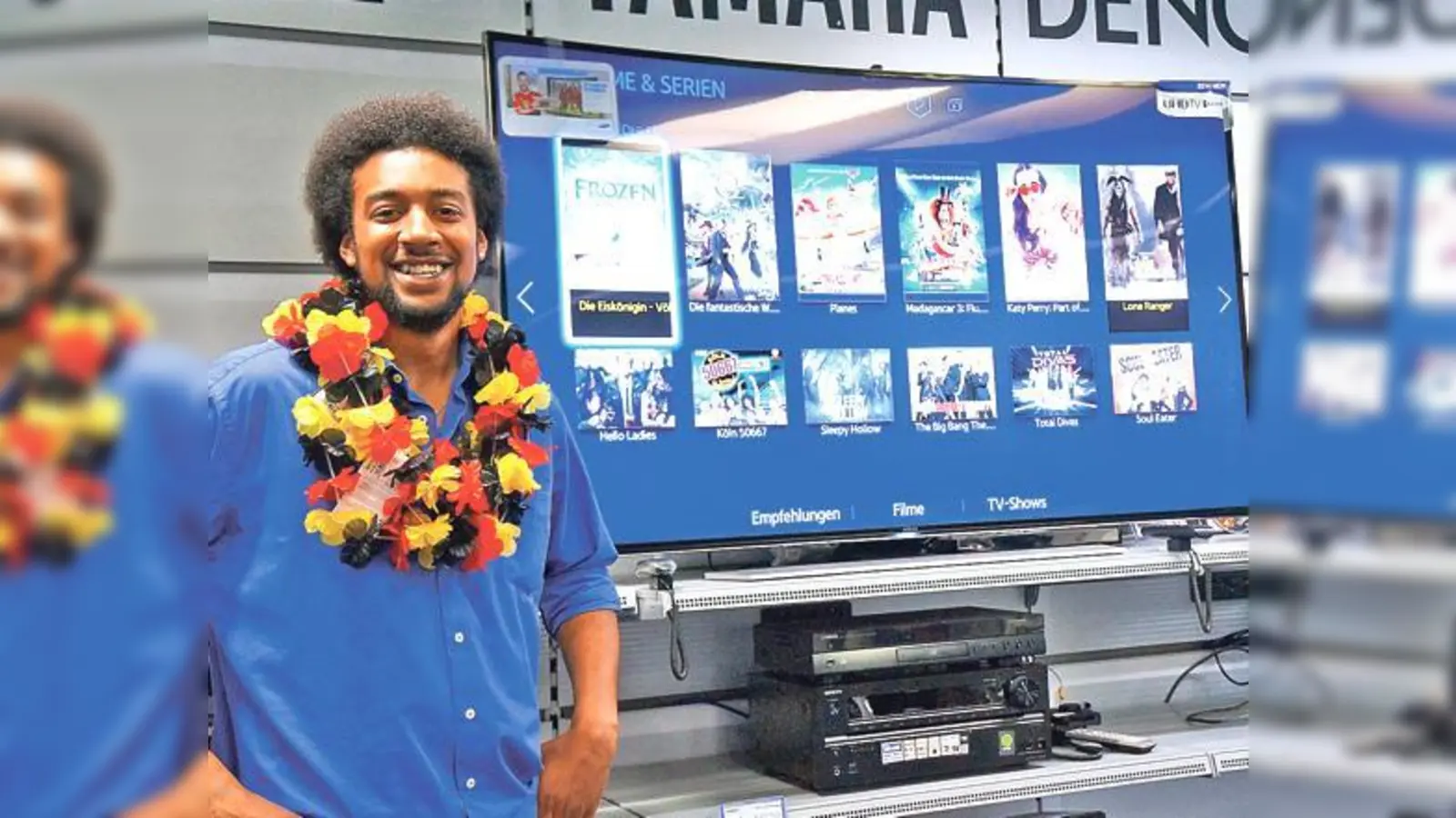 Das Runde muss ins  (Foto: Wer bei dieser Fußballweltmeisterschaft nichts verpassen will, dem empfiehlt Fußballfan Valentin Geiger von Saturn einen Samsung-TV curved UHD.)