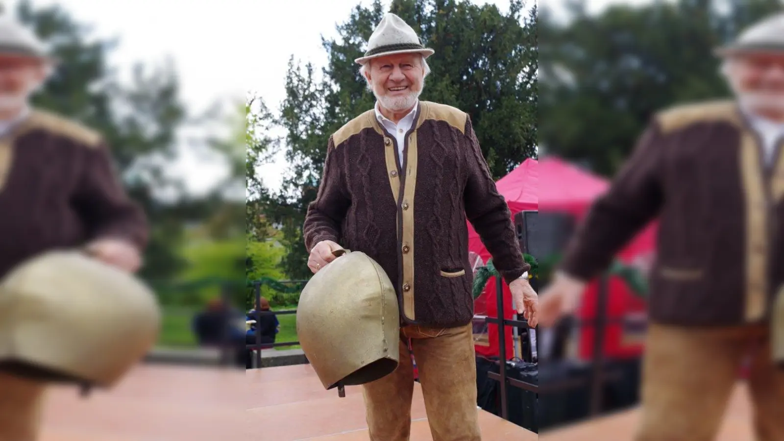 Hans Rotter, Vereinsvorsitzender der Laimer Maibaumfreunde, begrüßte zum Maifest und „klingelte“ die Auftritte auf der Festbühne an. (Foto: kö)