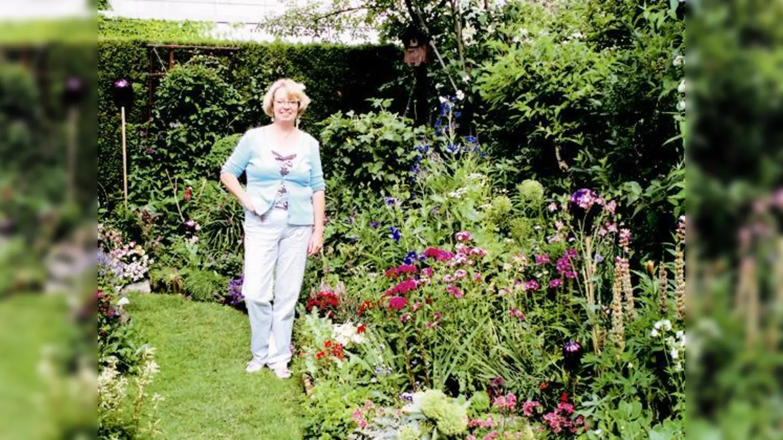 Regina Probst öffnet am Tag der offenen Gartentür ihren Garten in der Platanenstraße 34 in Taufkirchen für Gartenliebhaber.   (Foto: Woschee)