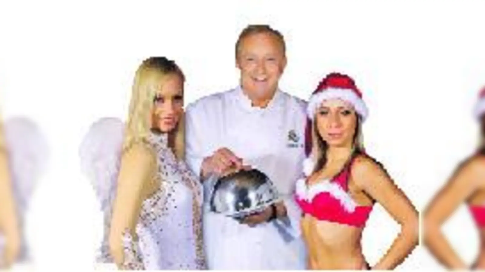 Alfons Schuhbeck mit Alisa (Engelchen) und Iryna (Weihnachtsfrau).  (Fotos: VA)