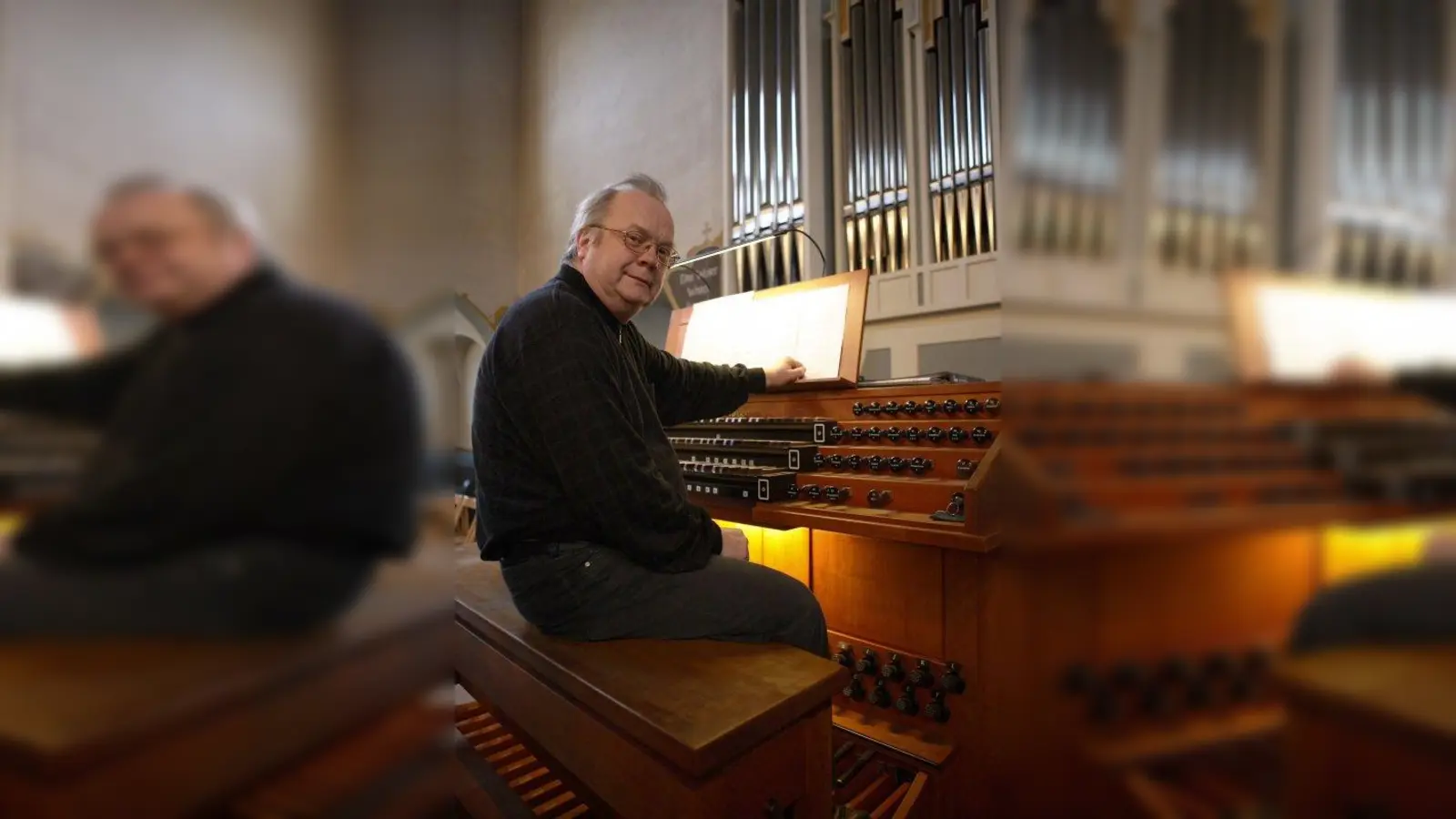 KMD Michael Grill an der Erlöserkirche (München). (Foto: privat)