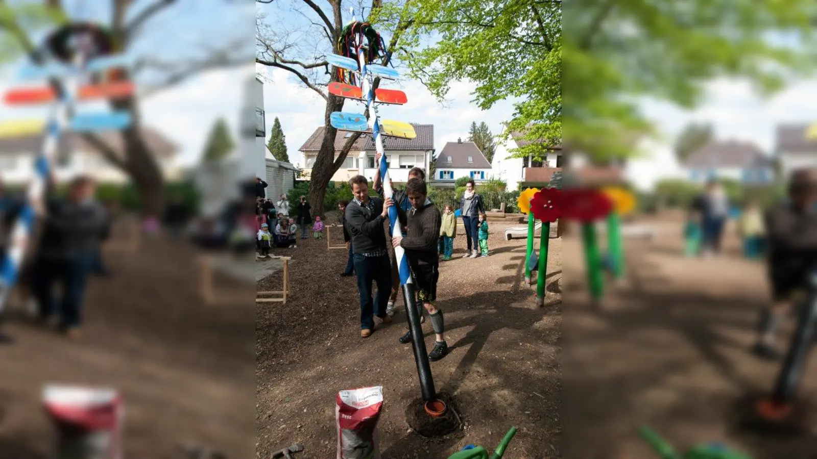 Väter der Laimer Eltern-Kind-Initiative &amp;quot;Die Bärchen e.V.&amp;quot; stellten am Donnerstag, 30. Mai, den Maibaum im Garten auf. (Foto: Witte/Die Bärchen e.V.)