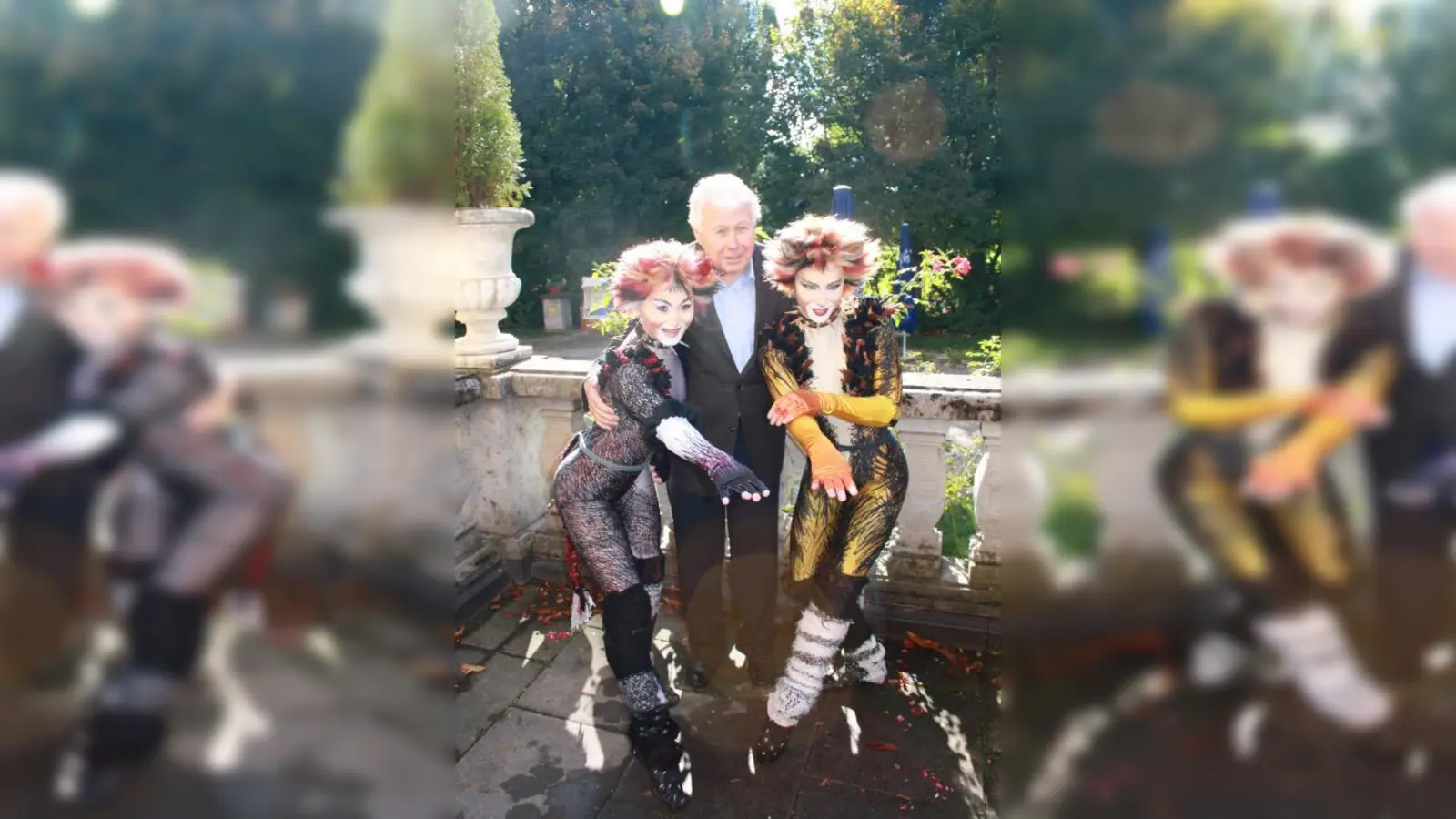 Peter Weck umgarnt von zwei Cats-Darstellerinnen. Sie sind zwei von insgesamt 19 neu gecasteten Tänzern, die sich als die Besten der Besten betiteln dürfen. (Foto: vj)