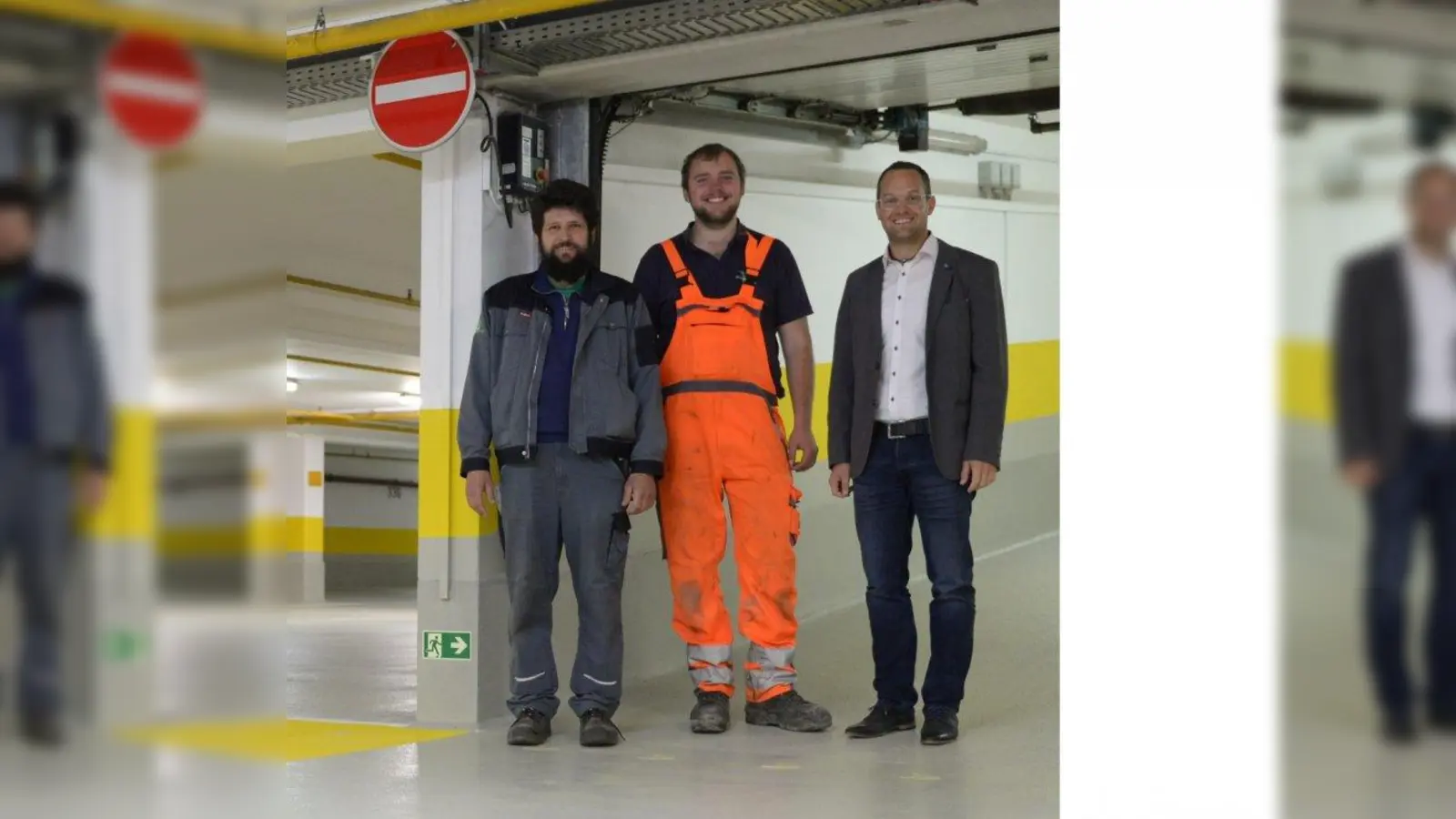 Johann Thalmayr und Michael Hager (beide von den Stadtwerken Weilheim) und Bernhard Strobl (Leiter der VR-Bank Hausverwaltung) (von links) freuen sich: Innerhalb des Budgets und im gesteckten Zeitrahmen  wurde die Bodenplatte in der  Tiefgarage im „Altstadt Center“ saniert. (Foto: Stadtwerke Weilheim)