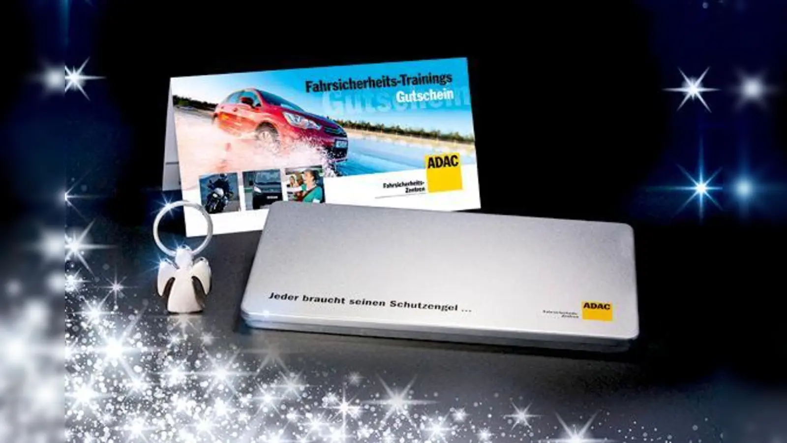 Zu Weihnachten einen Schutzengel verschenken: ADAC Geschenkbox mit Schlüsselanhänger und Fahrsicherheits-Trainingsgutschein.	 (Foto: ADAC)