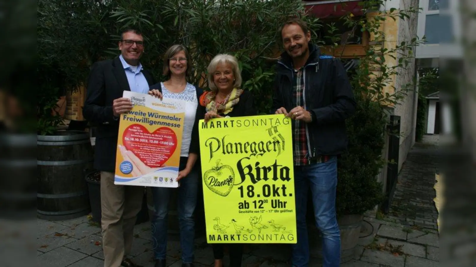 Werner Plettner, Andrea Schüler von der Würmtal-Insel, Claudia Weiß-Hofmann und Jens Toepel (v.l.) freuen sich auf eine zünftige Kirta am Sonntag, 18. Oktober, auf der Planegger Bahnhofstraße. (Foto: BKr)
