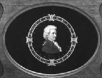 Hinterglasbildnis von Wolfgang Amadeus Mozart im Oberrahmen eines Klaviers von Leopold Ehret, München um 1870.Foto: P. Fliegauf, D. Jordens-M., Münchner Stadtmuseum