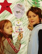 Die kleinen Besucher malten mit viel Liebe, was Weihnachten für sie bedeutet. 	Foto: NEUE WEGE