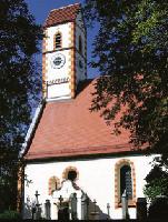 An der altehrwürdigen Moosacher St.-Martinskirche kommen die Stadtteilläufer an. 	Foto: Archiv
