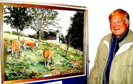 Der Kirchseeoner Maler Hans Niedermaier mit einem seiner vielen Landschaftsbilder.	Foto: Verein