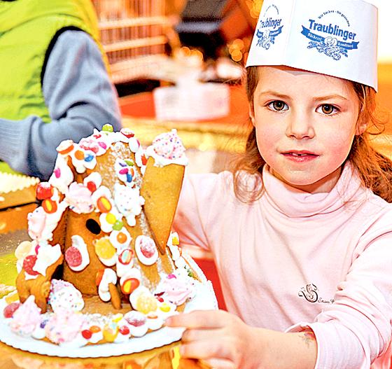 Lecker, schmecker, Zuckerbäcker: Zusammen mit Konditoren der Bäckerei Traublinger können Kinder ein Hexenhaus backen.