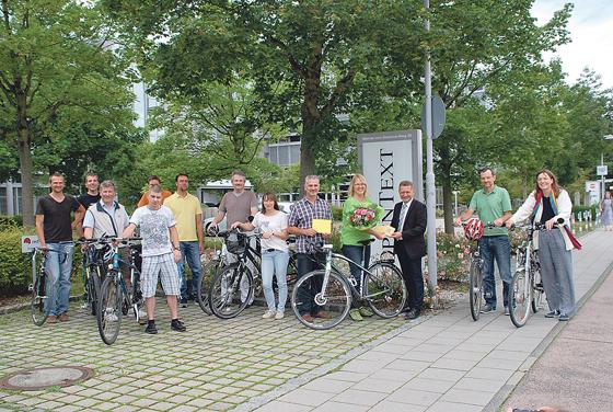 Erster Bürgermeister Klaus Korneder mit dem Open Text-Radteam	Foto: Gemeinde Grasbrunn