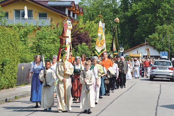 Die Pfarreien Rosenkranzkönigin und St. Bruder Klaus feiern gemeinsam die Fronleichnamprozession.	Foto: VA